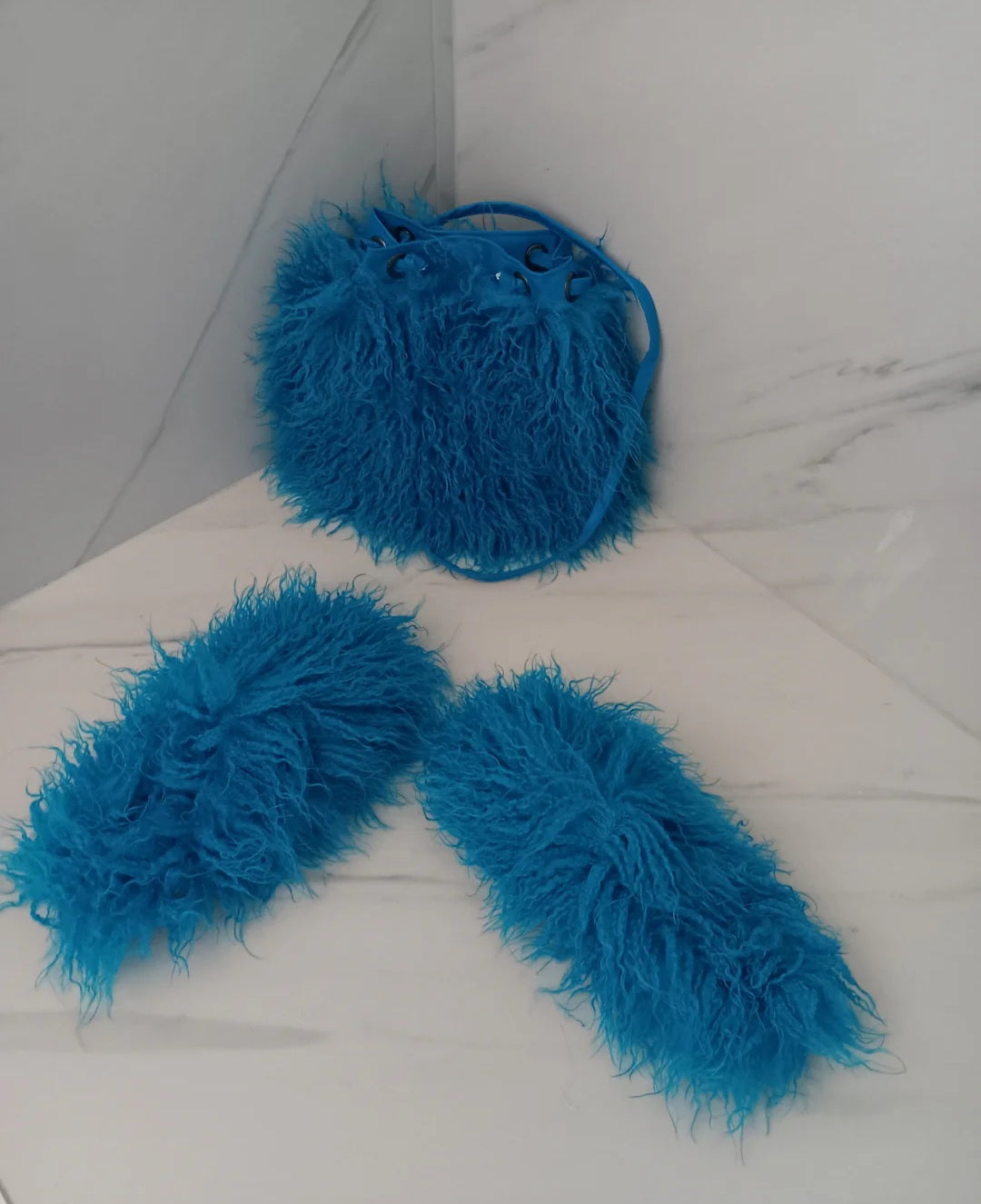 Blue fur slides and Bag